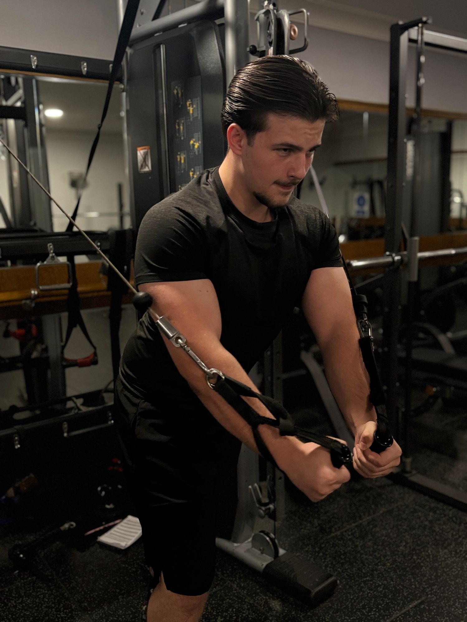 Zak Rickard training on the cable machine